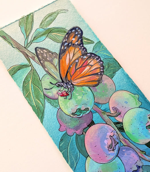 Butterfly Reading at the Blueberry Bush